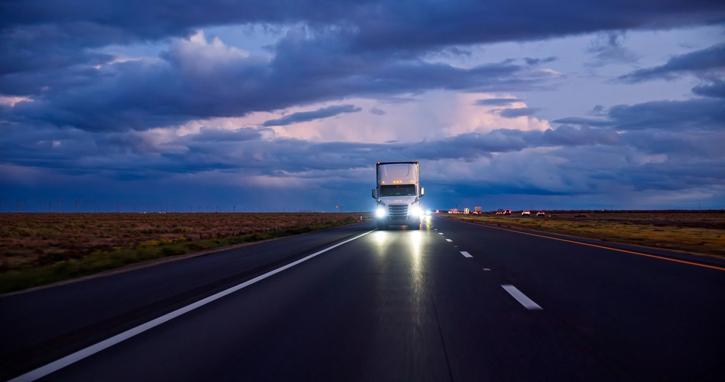 Secure ground transportation truck on a California highway