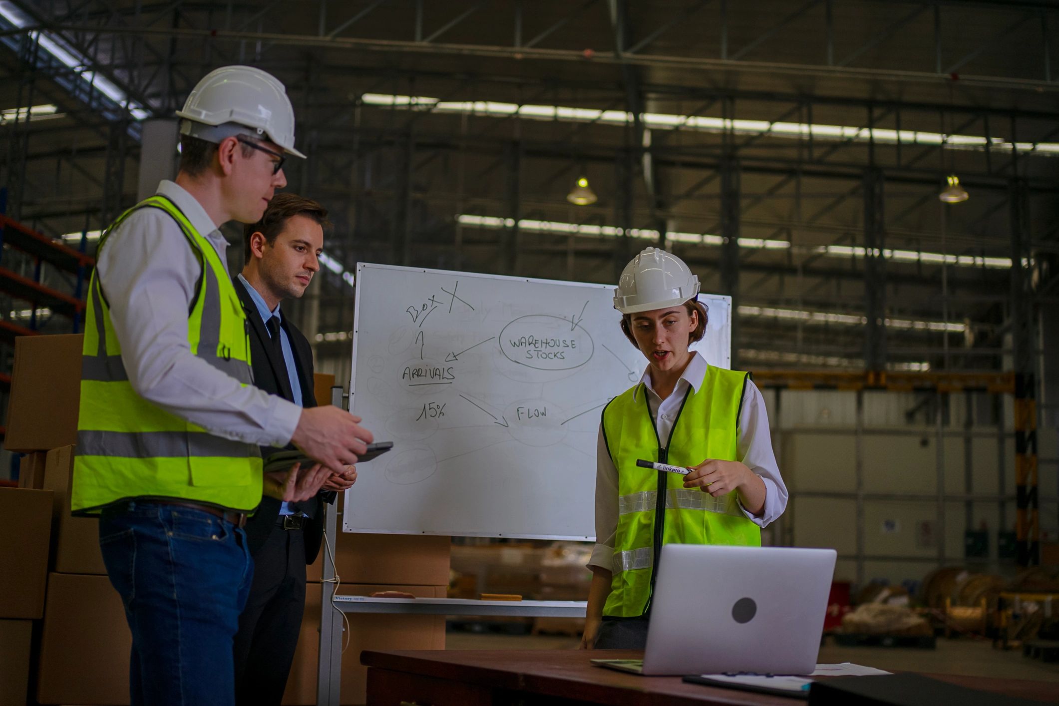 Warehouse team meeting in a professional logistics environment
